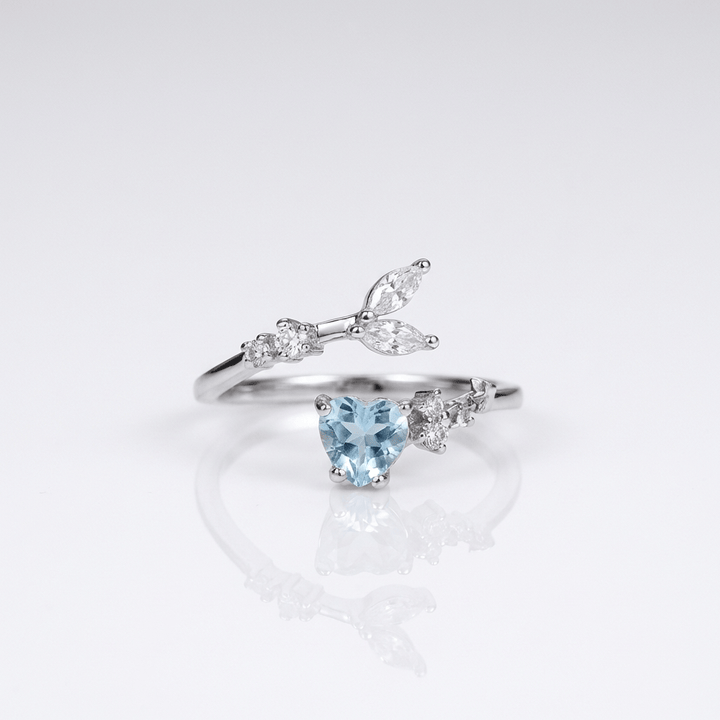 SILVER BLUE TOPAZ SOLITAIRE RING - (ADJUSTABLE)