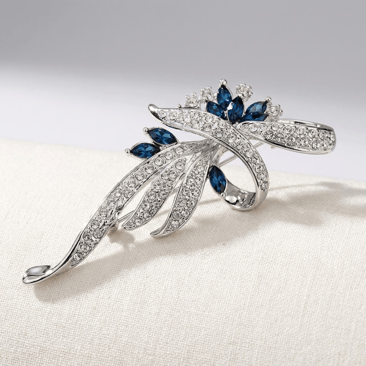 SAPPHIRE SWIRL BROOCH